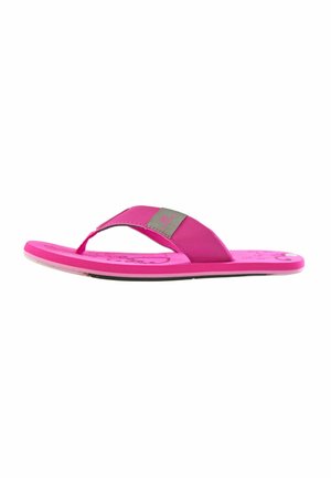 Bright pink flip-flop sandal with a single wide strap featuring a gray logo patch, and a thong toe post on a flat sole.