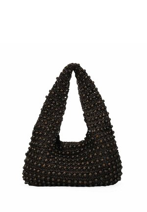 Pequeño bolso negro cubierto de cuentas redondas con un asa en forma de lazo y una forma suave y redondeada, mostrado sobre un fondo blanco.