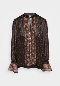 Blusa nera trasparente con motivo floreale, dotata di chiusura frontale con bottoni, collo a fiocco e maniche svasate con dettagli in tessuto a contrasto.