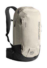 Hellbeige und schwarze Ortovox Freerider 22 Rucksack mit gepolsterten Trageriemen, mehreren Reißverschlussfächern und verstellbarem Hüftgurt.