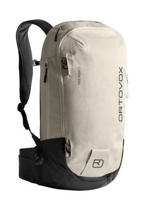 Hellbeige und schwarze Ortovox Freerider 22 Rucksack mit gepolsterten Trageriemen, mehreren Reißverschlussfächern und verstellbarem Hüftgurt.
