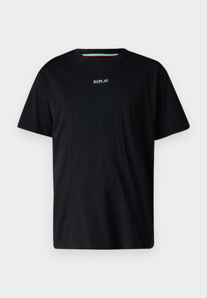 T-shirt in cotone nero con collo tondo e maniche corte. La parola "REPLAY" è ricamata in bianco al centro del petto.