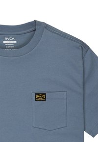 Gray cotton t-shirt with a crew neckline, relaxed fit, and a left chest pocket featuring a black and yellow logo patch.