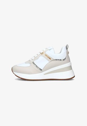 Beige and white sneaker with a textured design, featuring a wedge sole, lace-up closure, and gold hardware accents.