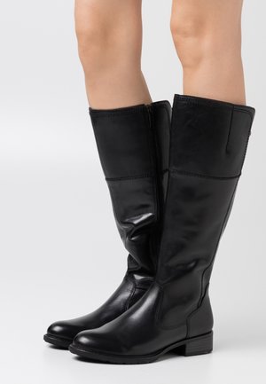 Zwarte kniehoge leren laarzen met een gladde textuur, rits aan de zijkant en een lage blokhak. Strak ontwerp met contrasterende stikdetails.