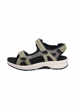 Light green and black sandals with adjustable straps, open toe design, cushioned footbed, and a white rubber sole.