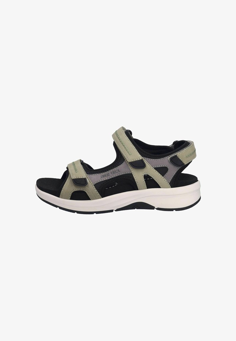 Vaaleanvihreät ja mustat sandaalit, joissa on säädettävät hihnat, avoin varvasdesign, pehmustettu pohja ja valkoinen kumipohja.