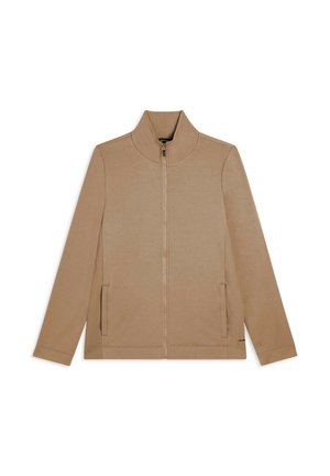 La giacca zip-up color beige presenta un col alto, maniche lunghe, tasche laterali e un pannello testurizzato sui lati. Tessuto morbido con un design minimal.