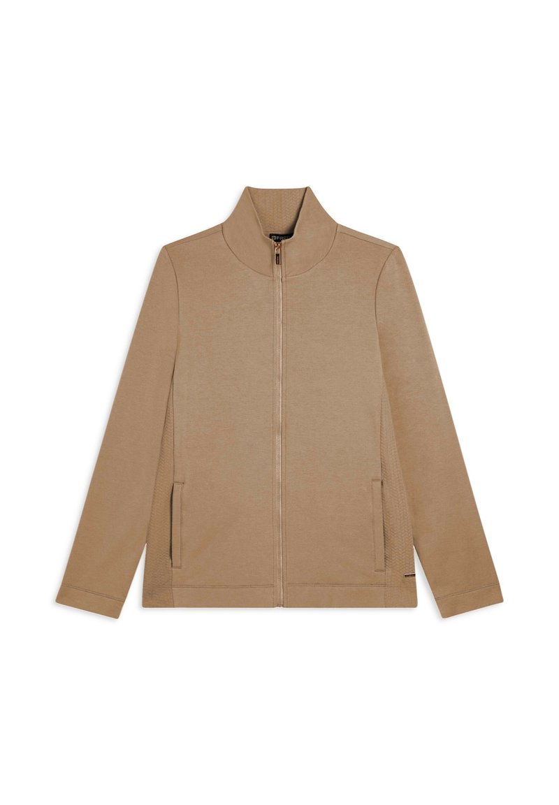 La giacca zip-up color beige presenta un col alto, maniche lunghe, tasche laterali e un pannello testurizzato sui lati. Tessuto morbido con un design minimal.