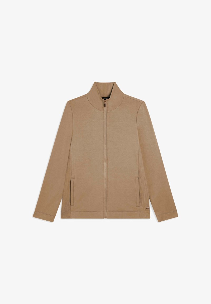 La giacca zip-up color beige presenta un col alto, maniche lunghe, tasche laterali e un pannello testurizzato sui lati. Tessuto morbido con un design minimal.