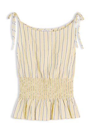 Haut sans manches jaune avec des rayures verticales blanches, grises et beiges, taille froncée, ourlet à volants et bretelles à nouer sur les épaules.