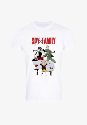 Hvid bomulds T-shirt med et farverigt grafisk print af tre karakterer fra "Spy x Family," med fed rød tekst ovenfor.