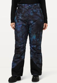 Zwarte en blauwe gestreepte skibroek met een losse pasvorm, ritszakken aan de zijkant en versterkte boorden. Gemaakt van duurzame, weerbestendige stof.