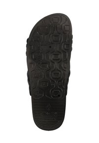 Czarna podeszwa sandałów o teksturowanej powierzchni, z okrągłymi i prostokątnymi wzorami oraz logo. Wykonane z materiałów wegańskich, elastyczny design.