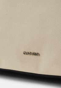 Calvin Klein GRACIE - Shopper - dark ecru