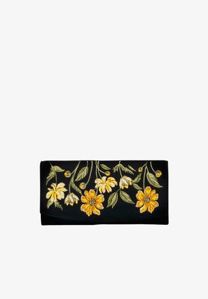 Must ristkülikukujuline käekott, millel on tikitud kollased ja valged õied ning allapoole ripuvad rohelised lehed.