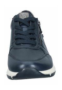 Navy leather sneaker with textured laces, side zipper, and white rubber sole; features a padded collar and stitched detailing.