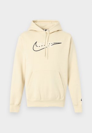 Μπεζ φούτερ Nike με τσέπη μπροστά, κουκούλα με κορδόνι και μαύρο λογότυπο στο στήθος. Μαλακό ύφασμα και ελαστικά τελειώματα στα μανίκια.