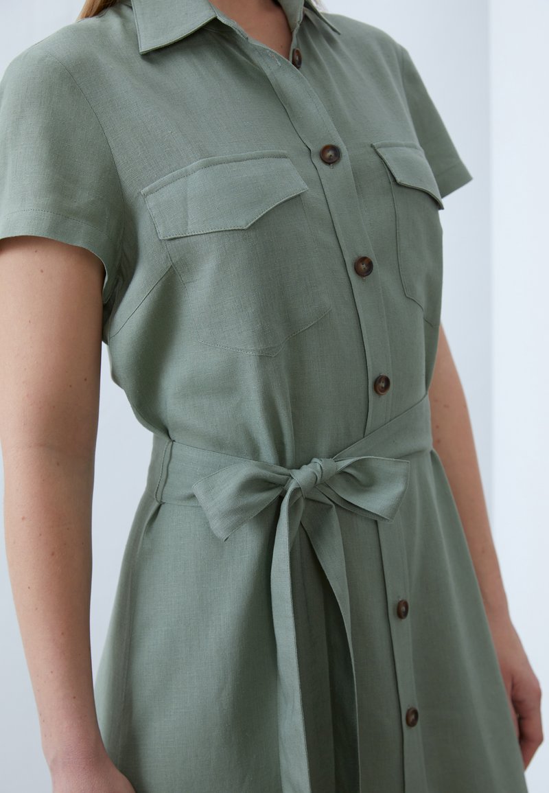 khaki shirt dress uk Susanna Reid is chic in khaki midi shirt dress from Sosandar