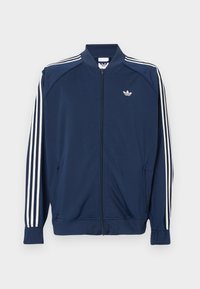 Μπλε ναυτικό μπουφάν με φερμουάρ από πολυεστέρα, με λευκές τρίχρωμες ρίγες στα μανίκια και μικρό λευκό λογότυπο στο στήθος.