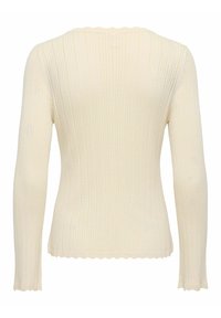 Pull à manches longues en maille côtelée couleur crème avec bords festonnés aux poignets et à l'ourlet, vu de dos.
