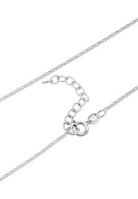 Collier en chaîne en argent avec un design flexible, une surface texturée et un fermoir en homard avec plusieurs maillons d'ajustement. Marqué "925".