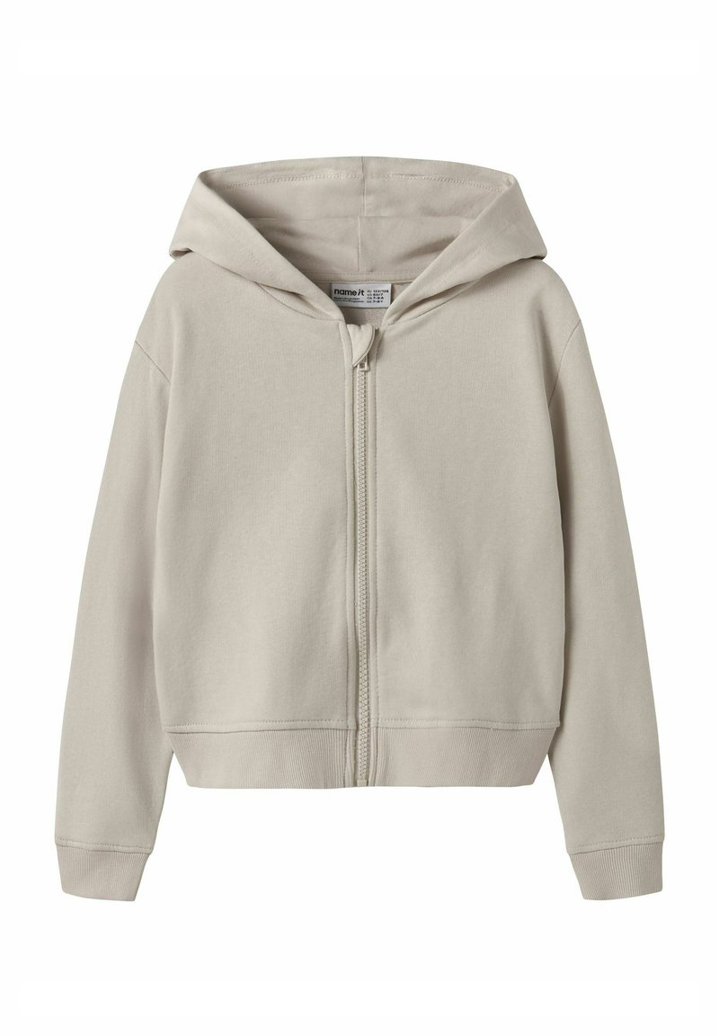 Helehall äärega lukuga dressipluus, mis on valmistatud pehmest puuvillasegust kangast. Varustatud esiluku, kängurutasku ja soonikkoes varrukaservadega, lõdvestunud istuvusega.