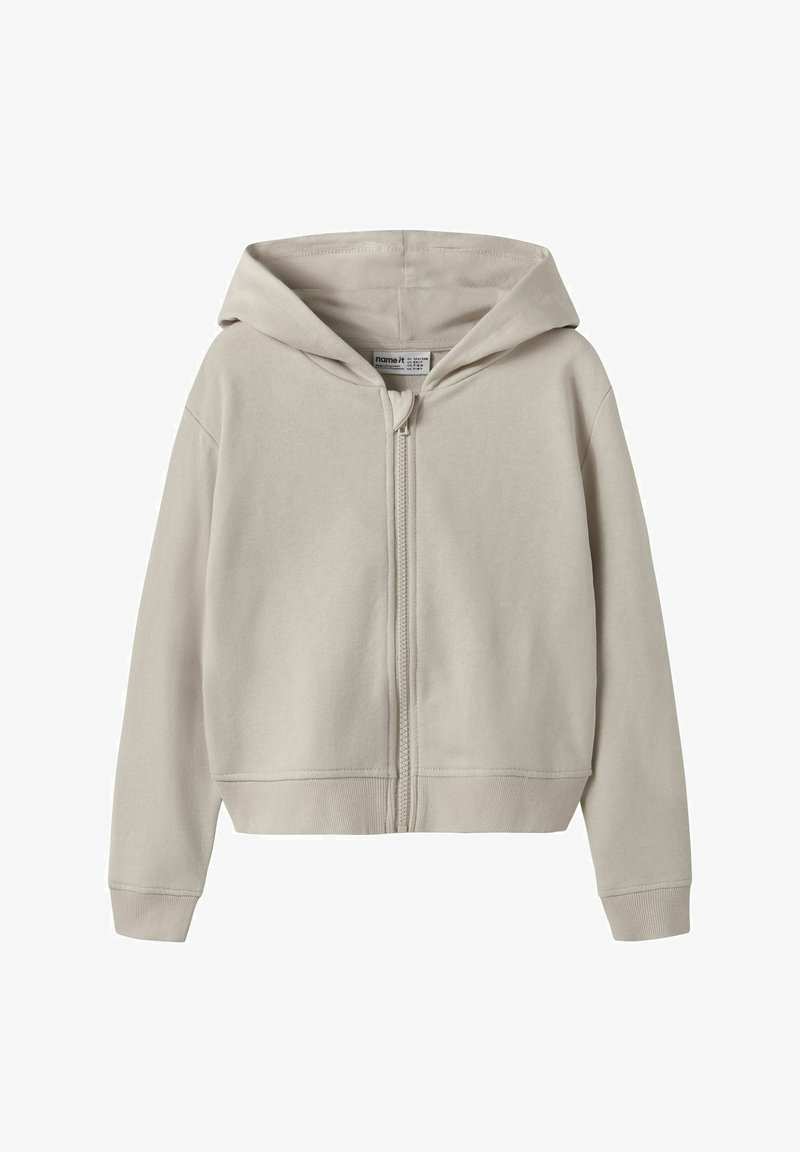 Helehall äärega lukuga dressipluus, mis on valmistatud pehmest puuvillasegust kangast. Varustatud esiluku, kängurutasku ja soonikkoes varrukaservadega, lõdvestunud istuvusega.