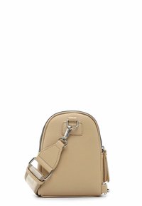 Round, beige leather bag with a textured finish. Features silver hardware, a top zipper, and a detachable strap with a fabric accent.