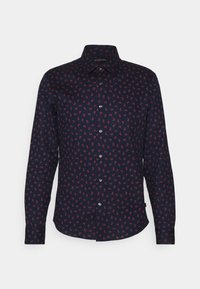 Mörk marinblå långärmad skjorta med knappar och små röda blommönster samt spetsig krage, skräddarsydd passform.
