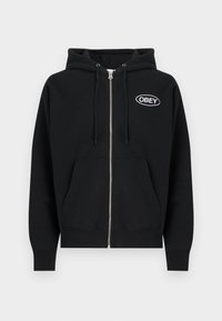 Μαύρο φούτερ με φερμουάρ από βαμβάκι, με μπροστινή τσέπη, κουκούλα με κορδόνι και κεντημένο λευκό λογότυπο "OBEY" στο στήθος.