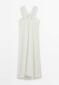 Robe blanche sans manches avec de fines rayures noires verticales et des larges bretelles nouées en un nœud dans le dos.
