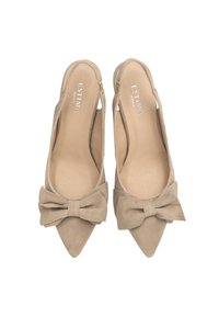 Beige, suede slingback heels with pointed toes and a prominent bow detail at the front. Smooth texture and a neutral color scheme.