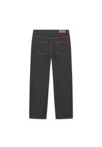 Dark denim jeans with a straight cut, featuring a waistband and two back pockets. Simple stitching and a tan leather patch at the back.