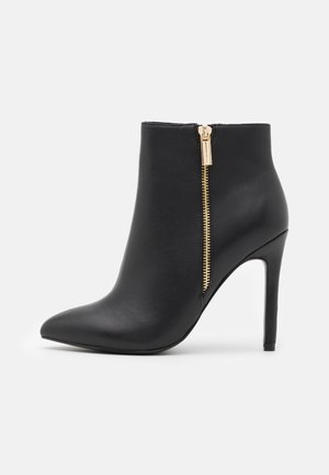 Botines de tacón - black