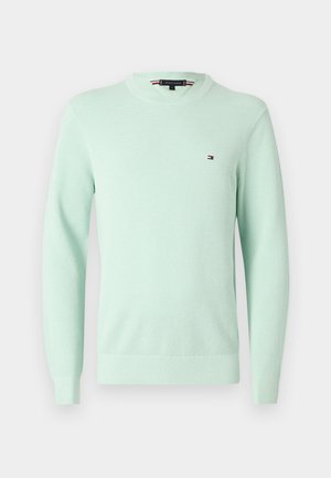 Lichtgroene gestructureerde gebreide trui met lange mouwen, ronde hals en klein Tommy Hilfiger-logo op de linkerborst.