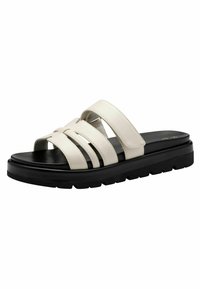 Sandal in pelle bianca con tre fasce larghe, punta aperta e suola spessa in gomma nera con superficie testurizzata e motivo a righe.