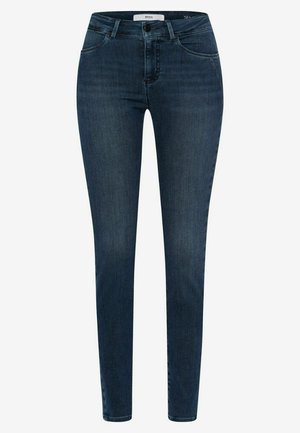 Skinny jeans made of dark blue denim, featuring a high waist, five pockets, and subtle stitching details for a tailored fit.