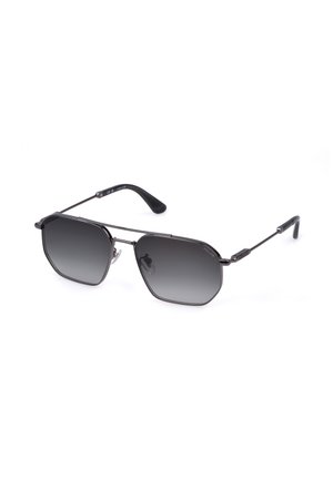Lunettes de soleil à monture métallique noire avec des verres rectangulaires à dégradé foncé et des branches fines, reposant sur une surface blanche.