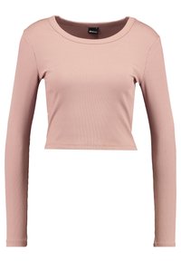 Dlouhá rukáv, krátký top z jemné, žebrované tkaniny. Barva je světle růžová, má kulatý výstřih a přiléhavé rukávy.