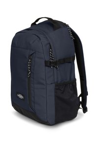 Zaino in tessuto blu navy dalla forma strutturata, con tasca frontale, dettagli neri e tasca laterale in rete nera a contrasto.