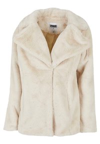 Giacca in pelliccia sintetica beige con ampio rever, maniche lunghe e vestibilità rilassata. L'interno è foderato con un tessuto beige liscio.