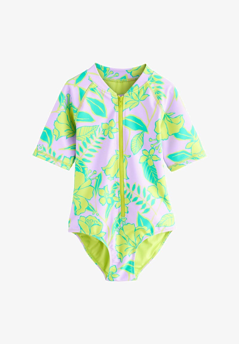 Bērnu īsām piedurknēm peldkostīms ar priekšējo rāvējslēdzēju, kas rotāts ar spilgti zaļiem un ziliem tropu ziedu motīviem uz blāvi purpura fona.