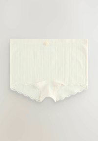 Lichtcrème kleurige katoenen slipjes met ribbelstructuur, kantafwerking aan de benen en een kleine rozenaccent op de tailleband.