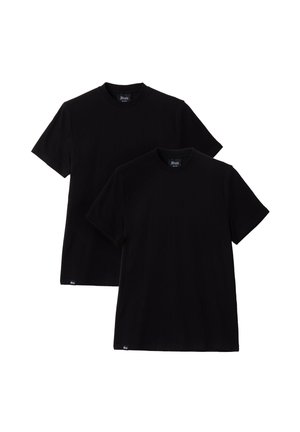 Dos camisetas negras de manga corta lisas apiladas, mostrando vista frontal con cuellos redondos y pequeñas etiquetas cerca del dobladillo inferior.