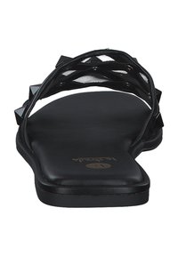 Black flat sandals with a rounded toe, featuring a mesh vamp adorned with square studs. Smooth textured sole, minimalist design.