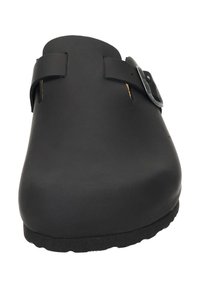 Schwarze Clogs mit glatter, matter Oberfläche. Verfügen über einen verstellbaren Riemen und eine äußere Gummisohle, die stabilen Halt und Komfort bietet.