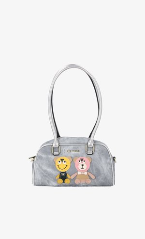 Gray handbag with two teddy bear patches, one yellow smiling with overalls and one pink with a bow tie, and silver double handles.