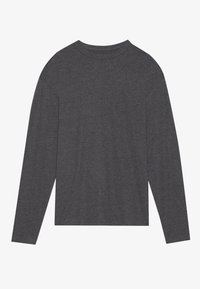 Langermet topp laget av et mykt, mørkegrått stoff. Har en avslappet passform og en rund halslinje. Enkel, sømløs design uten synlige detaljer.