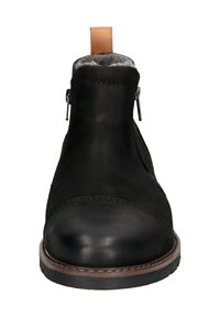 Schwarze Lederstiefeletten mit runder Zehenform, seitlichem Reißverschluss und brauner Sohle mit Nähten. Oben mit grauem Fell gefüttert.